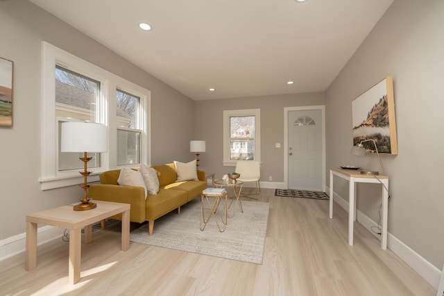 1634 Upton Ave N, Minneapolis, MN 55411 - living area featuring healthy amount of natural light, light wood-style floors, recessed lighting, and baseboards