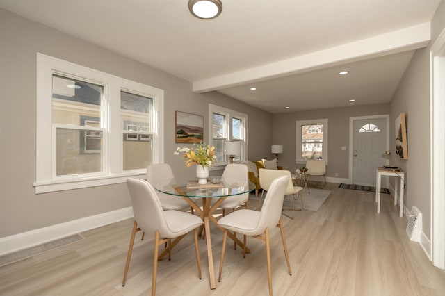 1634 Upton Ave N, Minneapolis, MN 55411 - dining room with light wood finished floors, baseboards, beam ceiling, and recessed lighting