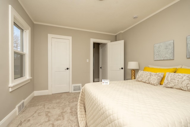 1634 Upton Ave N, Minneapolis, MN 55411 - carpeted bedroom with crown molding and baseboards