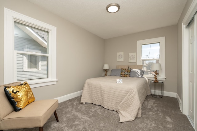 1634 Upton Ave N, Minneapolis, MN 55411 - carpeted bedroom with baseboards