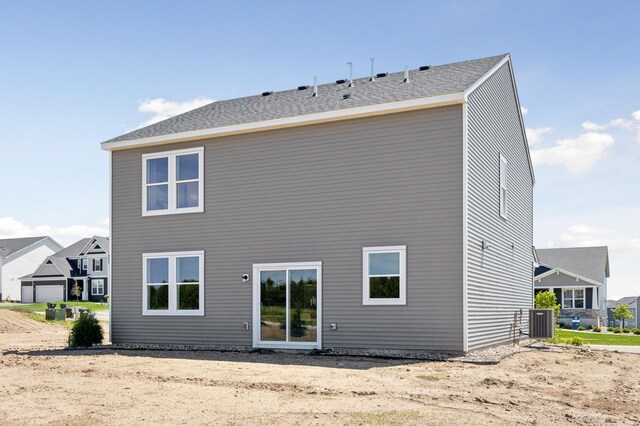 12514 Erskin St NE, Blaine, MN 55449 - back of house with cooling unit