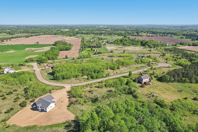 aerial view of property and surrounding area with rural landscape