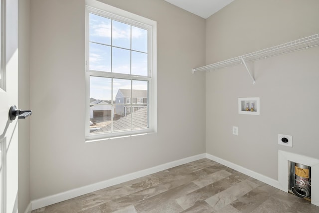 washroom featuring hookup for a washing machine, hookup for an electric dryer, laundry area, and baseboards