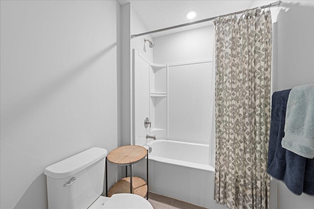 full bath with shower / bath combination with curtain and toilet