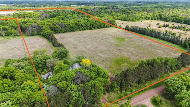 25431 Larch St NW, Isanti, MN 55040 - aerial view of property's location with property boundaries highlighted and a heavily wooded area