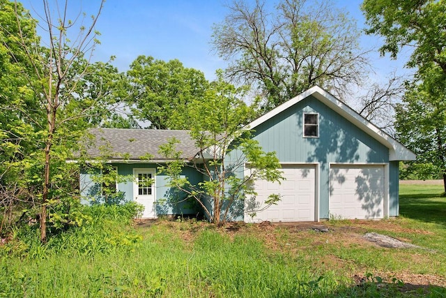 25431 Larch St NW, Isanti, MN 55040 - back of house with a shingled roof