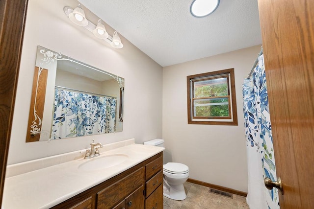 25431 Larch St NW, Isanti, MN 55040 - full bathroom featuring vanity, a textured ceiling, and a shower with shower curtain