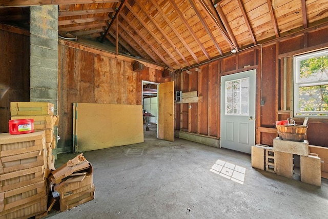 25431 Larch St NW, Isanti, MN 55040 - miscellaneous room with lofted ceiling and concrete floors