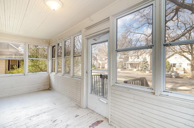 1040 26th Ave SE, Minneapolis, MN 55414 - unfurnished sunroom with plenty of natural light