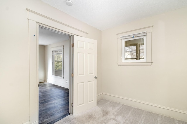 1040 26th Ave SE, Minneapolis, MN 55414 - carpeted empty room featuring baseboards