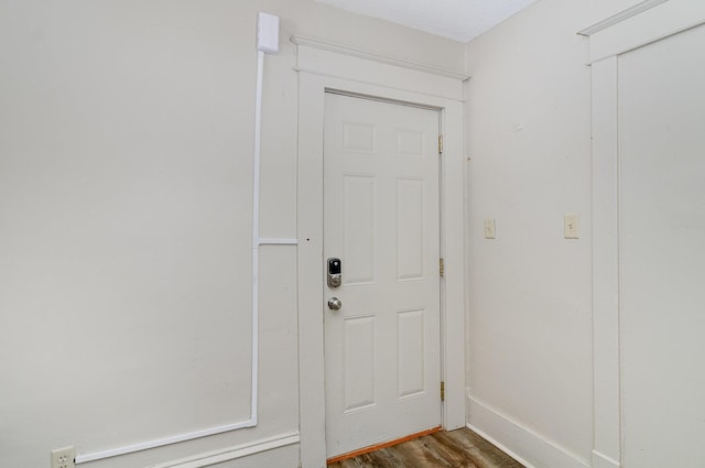 1040 26th Ave SE, Minneapolis, MN 55414 - entryway with dark wood finished floors and baseboards