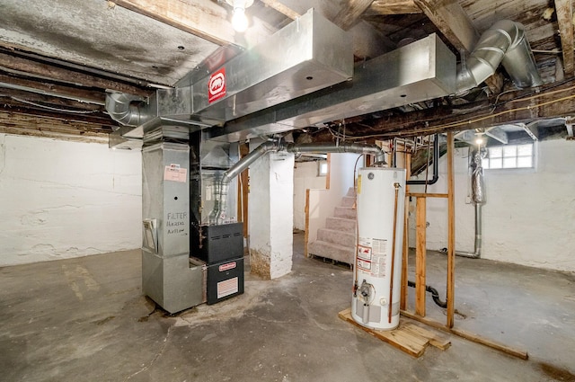 1040 26th Ave SE, Minneapolis, MN 55414 - below grade area with stairs, heating unit, and gas water heater