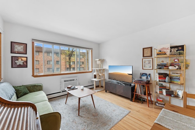 2112 Garfield Ave Unit 6, Minneapolis, MN 55405 - living room with baseboard heating, a wall unit AC, wood finished floors, and a baseboard radiator