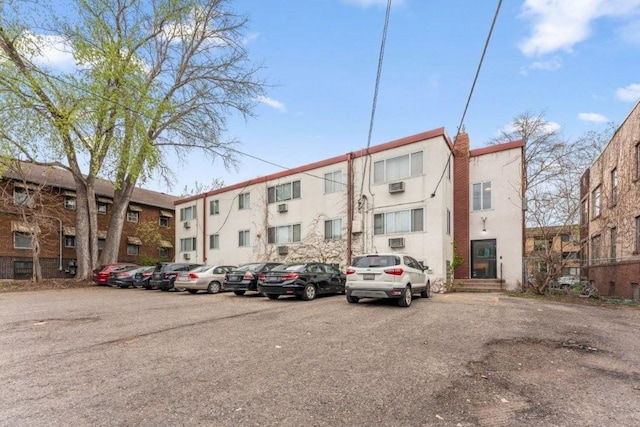 2112 Garfield Ave Unit 6, Minneapolis, MN 55405 - view of property featuring uncovered parking