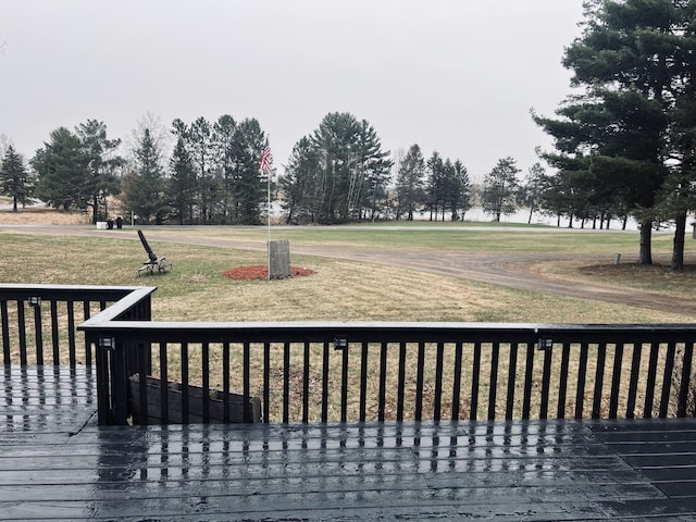 deck featuring a yard