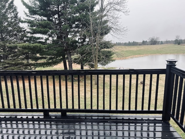 wooden deck with a yard