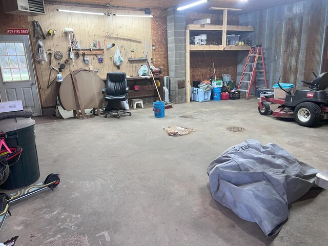 garage with a workshop area