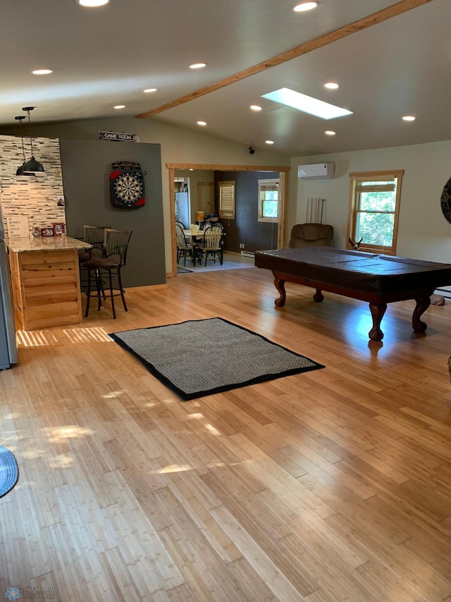 23062 Gosslee Ln, Dunn Twp, MN 56501 - recreation room featuring an AC wall unit, vaulted ceiling, billiards table, and light wood-style flooring