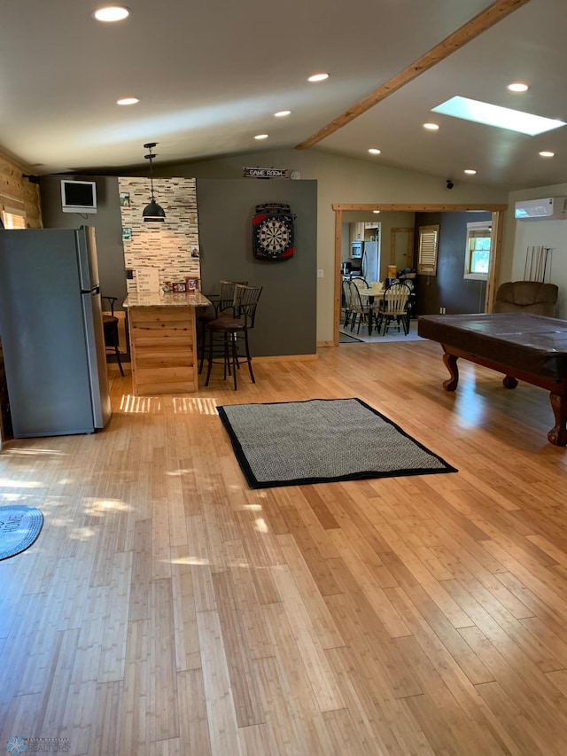23062 Gosslee Ln, Dunn Twp, MN 56501 - living room with light wood-style flooring, billiards table, and a skylight