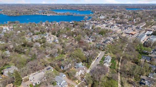 aerial view featuring a residential view and a water view
