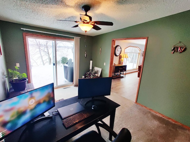 20361 Rolling Acres Dr, Eden Lake Twp, MN 56368 - office area featuring plenty of natural light, ceiling fan, a textured ceiling, and carpet flooring