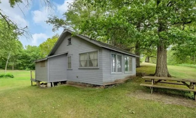 20361 Rolling Acres Dr, Eden Lake Twp, MN 56368 - view of side of home featuring a lawn