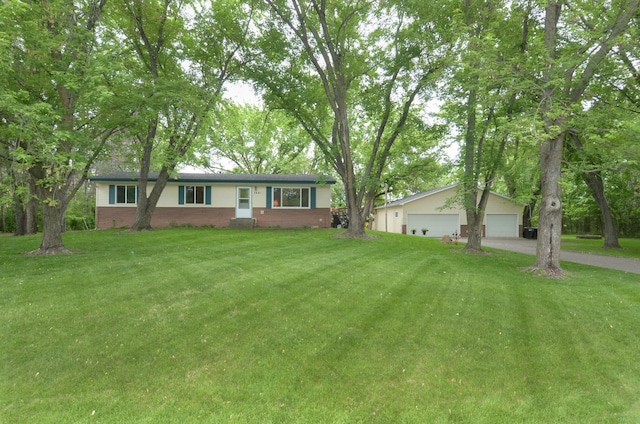 7441 164th Ln NW, Ramsey, MN 55303 - single story home featuring a front yard, a garage, and brick siding