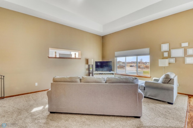 living room featuring baseboards