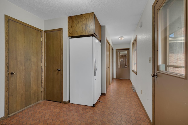420 6th Ave N, Cold Spring, MN 56320 - corridor featuring a textured ceiling