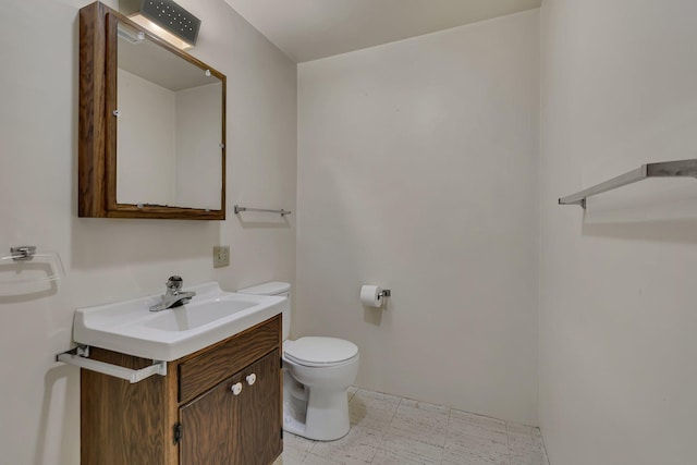 420 6th Ave N, Cold Spring, MN 56320 - half bath with toilet, tile patterned floors, and vanity