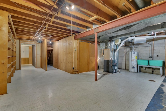 420 6th Ave N, Cold Spring, MN 56320 - unfinished basement featuring tile patterned floors, stairway, heating unit, and gas water heater