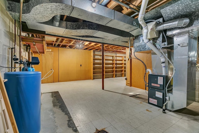 420 6th Ave N, Cold Spring, MN 56320 - unfinished below grade area featuring heating unit and tile patterned floors