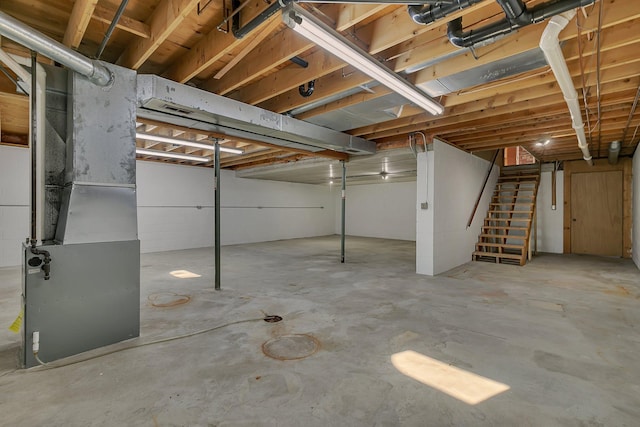 420 6th Ave N, Cold Spring, MN 56320 - unfinished basement featuring stairway and heating unit