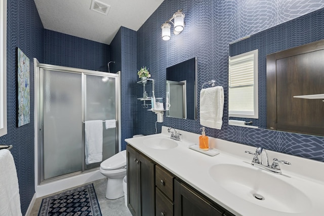 1703 11th St NE, Buffalo, MN 55313 - bathroom featuring toilet, a stall shower, double vanity, and lofted ceiling