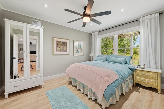 1703 11th St NE, Buffalo, MN 55313 - bedroom with light wood-style floors, baseboards, recessed lighting, and a ceiling fan