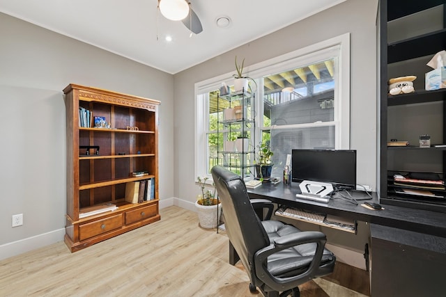 1703 11th St NE, Buffalo, MN 55313 - home office featuring wood finished floors, baseboards, and ceiling fan