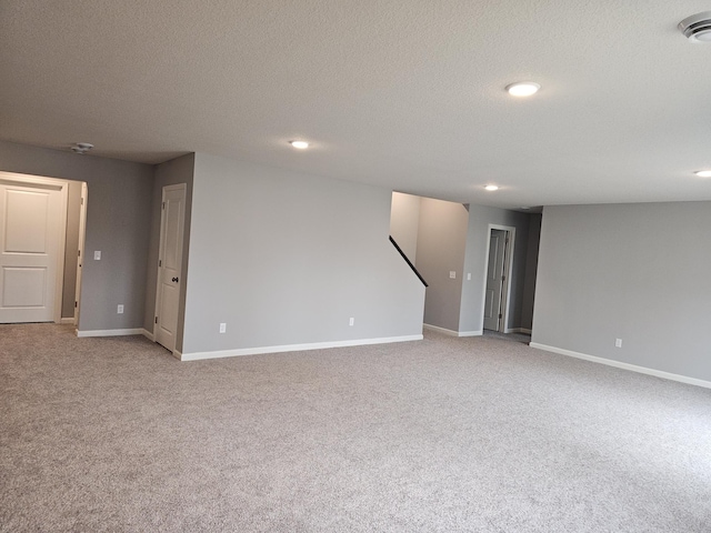 17121 61st St NE, Otsego, MN 55330 - unfurnished room featuring baseboards, recessed lighting, light carpet, and stairway