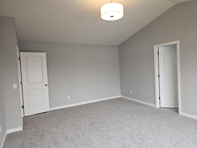 17121 61st St NE, Otsego, MN 55330 - carpeted spare room with baseboards and vaulted ceiling
