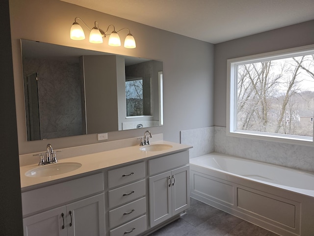 17121 61st St NE, Otsego, MN 55330 - full bath with a garden tub, a sink, tile patterned floors, and double vanity
