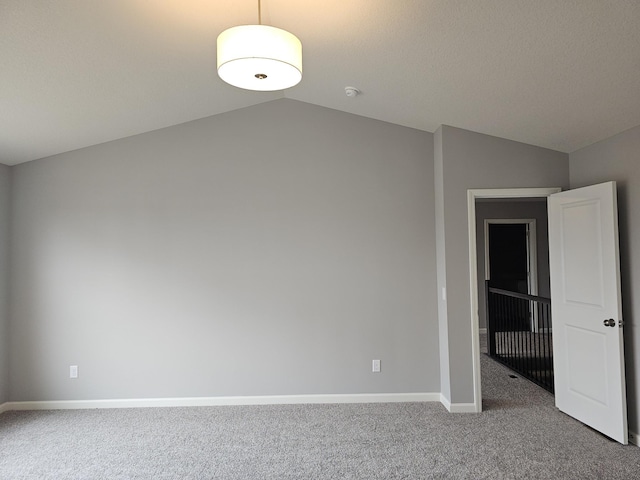 17121 61st St NE, Otsego, MN 55330 - carpeted spare room featuring baseboards and vaulted ceiling