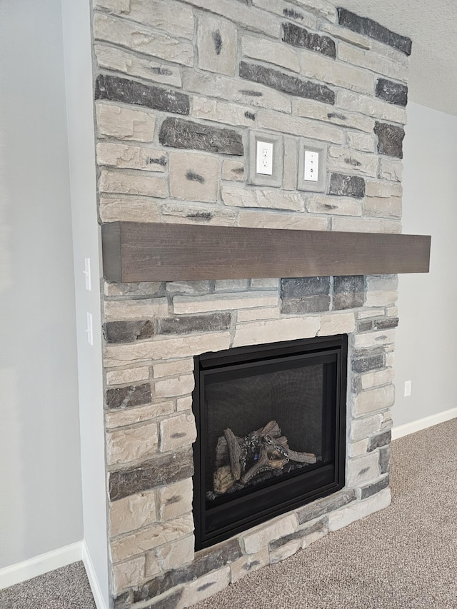 17121 61st St NE, Otsego, MN 55330 - details featuring baseboards, a fireplace, and carpet floors