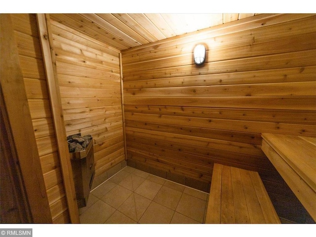 4371 Wilshire Blvd Unit 202, Mound, MN 55364 - relaxing sauna / steam room featuring tile patterned flooring and wooden walls