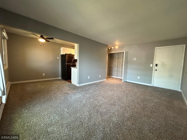 4371 Wilshire Blvd Unit 202, Mound, MN 55364 - carpeted empty room with ceiling fan and a textured ceiling