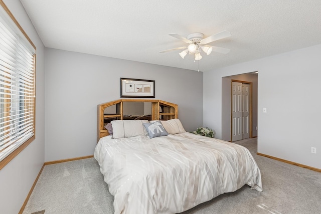 3662 Pond View Pt, Eagan, MN 55122 - bedroom with light colored carpet, baseboards, and a ceiling fan