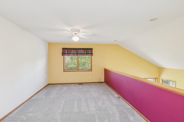 3662 Pond View Pt, Eagan, MN 55122 - additional living space featuring ceiling fan, carpet, baseboards, and lofted ceiling