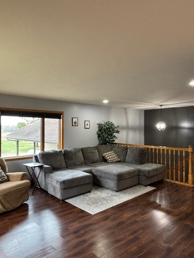 living area with recessed lighting and wood finished floors
