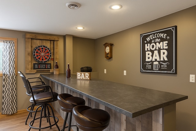 602 Nelson St W, Eagle Bend, MN 56446 - indoor dry bar with wood finished floors, baseboards, and recessed lighting