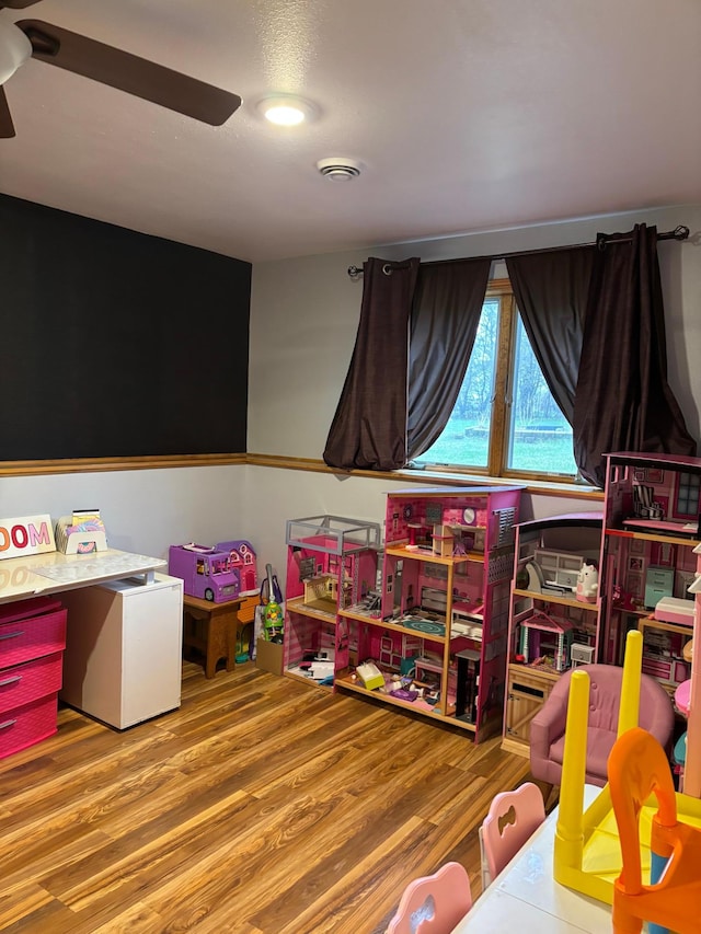 602 Nelson St W, Eagle Bend, MN 56446 - rec room featuring wood finished floors and ceiling fan