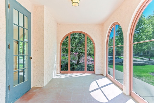 4606 Drexel Ave, Edina, MN 55424 - doorway to outside with a textured wall and tile patterned floors