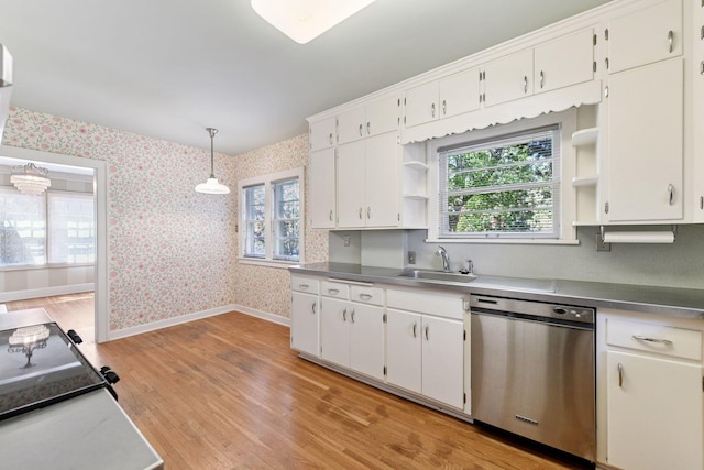 4606 Drexel Ave, Edina, MN 55424 - kitchen featuring stainless steel dishwasher, open shelves, a sink, wallpapered walls, and baseboards